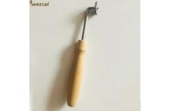 China Beekeeper Beehive Tools Wooden Handle Spur Embedder With Small Gear For Beekeeping supplier