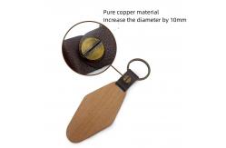 China Customized Rhombus Wooden Keychain 14g Personalized Engraved Watel Walnut supplier