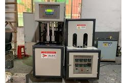 China 1L 1.5L Plastic PET Bottle Blowing Machine 2 Cavity Semi Automatic supplier