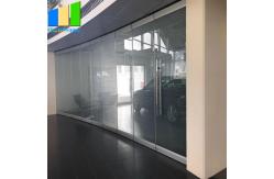 China Modern Style Sliding Partition Walls Movable Frameless Folding Glass Doors supplier