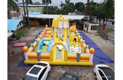China Yellow Duck With Big Slides And Bouncy Jumping Inflatable Castle supplier