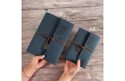 China 6 Ring Binding Travel Journal Notebook Maple Leaf Embossed Logo With Retro Pendent supplier