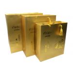 Custom Luxury Printed Gold Paper Gift Bags With Embossed Logo Tassel Handles for sale