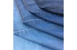 China Sustainable 100% Lycra 5.8/5.4oz Denim Jeans Fabric Plain Dyed supplier