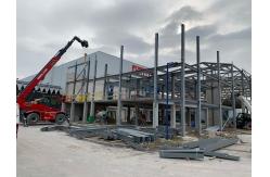 China Customizable Steel Structure Warehouse Building With Rolling Door supplier