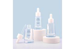 China 30ml Serum Oil Dropper Glass Bottle With Press Pump supplier