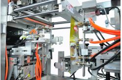 China Automatic Bag Feeding Liquid Packaging Machine Stand Up Pouch Spout Pouch Juice Sauce supplier