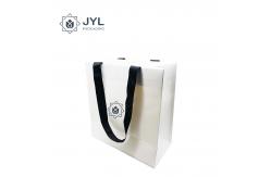 China RoHs Embossing Recycled Paper Gift Bags With Handles Antibacterial Rectangle supplier