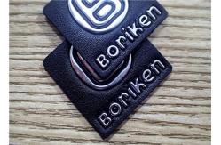 China Black Embossed Leather Patches With Silver Embossment TPU Logo For Bags supplier