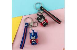 China Keychain Optimus Robot Men And Women Doll Couple Key Chain supplier